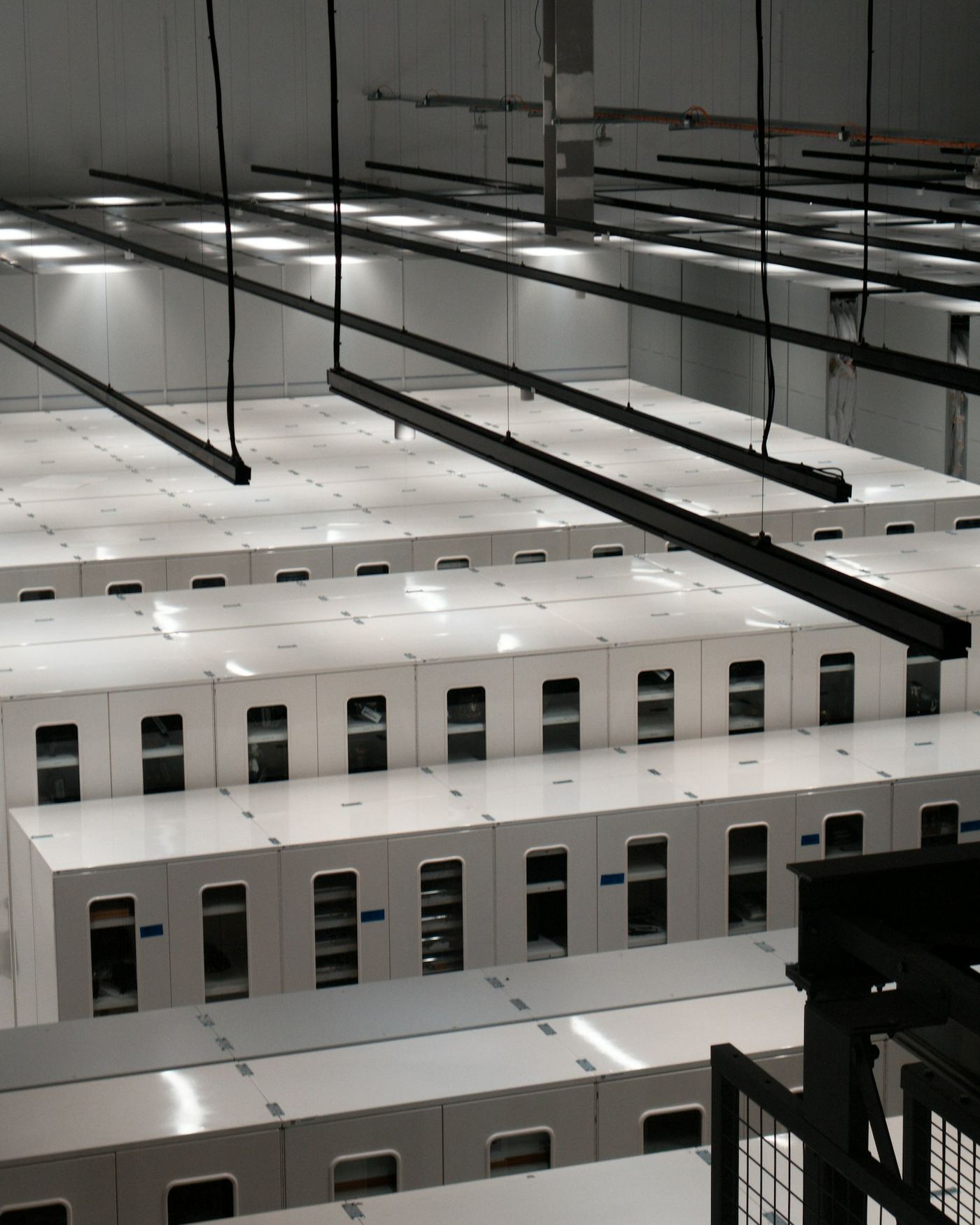 Data center hall with rows of server cabinets